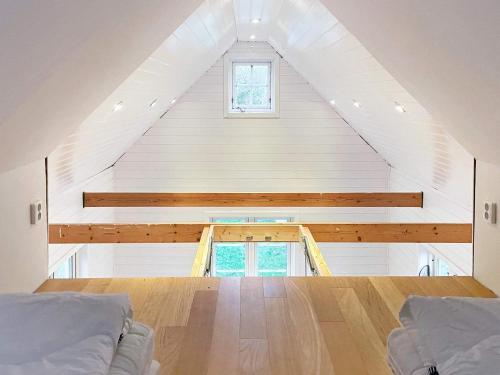a loft conversion of a house with two beds at 4 star holiday home in TORHAMN-By Traum in Torhamn