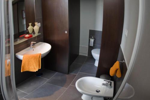 a bathroom with a sink and a toilet at B&B Civico 16 in Naples