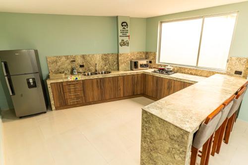 APARTAMENTOS MONACOにあるキッチンまたは簡易キッチン