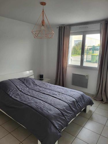 Postel nebo postele na pokoji v ubytování Appartement camon