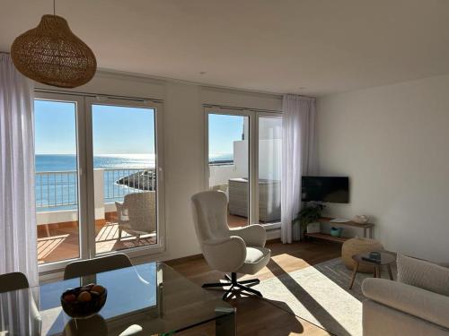 a living room with a view of the ocean at Atico Mosean in Vinaròs