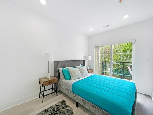 a bedroom with a bed and a window at Mary's Stay Brookland in Washington