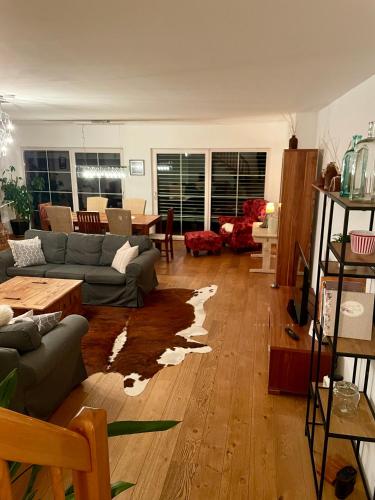 a living room with a couch and a table at Casa Anna in Villach
