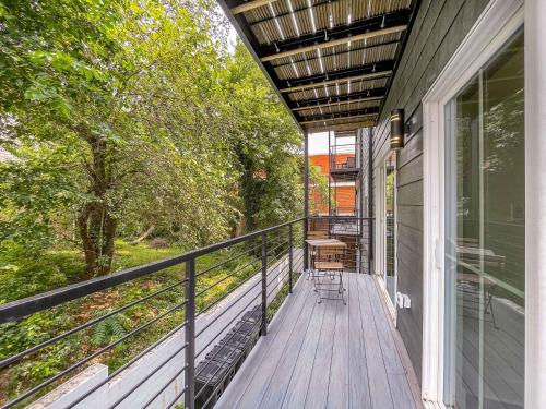 a balcony of a house with benches on it at Mary's Stay Brookland in Washington