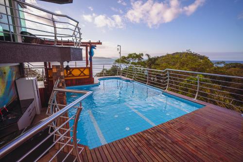 a swimming pool on the deck of a cruise ship at Pousada Mirante do César in Bombinhas