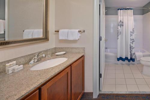 a bathroom with a sink and a shower at Residence Inn Hartford Avon in Avon