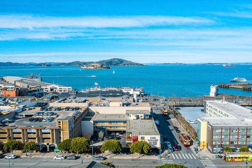 an aerial view of a city and the ocean at The Wharf Inn in San Francisco