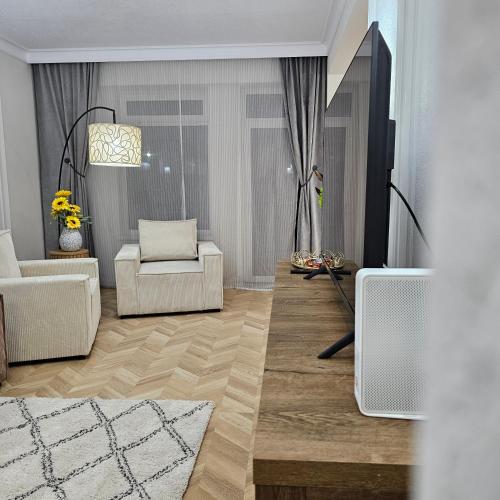 Μια τηλεόραση ή/και κέντρο ψυχαγωγίας στο Apartament M2 Vatra Dornei