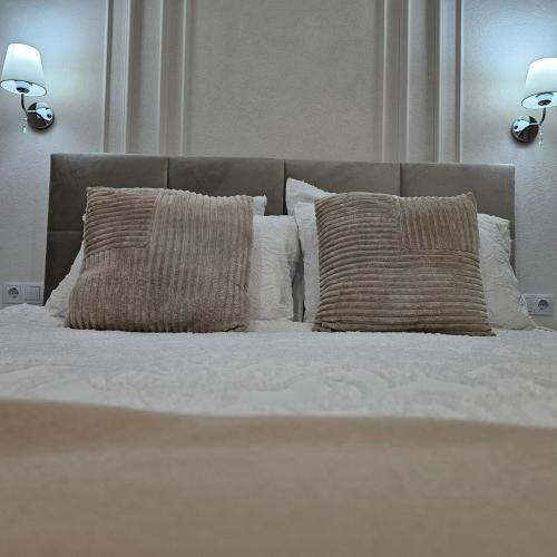 Ένα ή περισσότερα κρεβάτια σε δωμάτιο στο Apartament M2 Vatra Dornei