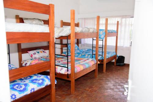 a group of bunk beds in a room at Jabulani Nairobi Backpackers Hostel in Nairobi