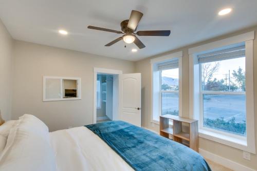 a bedroom with a bed and a ceiling fan at Stylish Logan Retreat with Smart TV and Central A and C! in Logan
