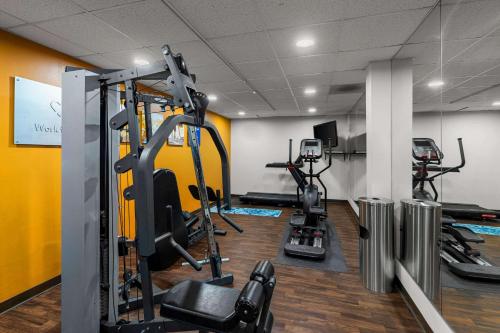 a gym with treadmills and machines in a room at Comfort Suites Vacaville-Napa Valley Area in Vacaville