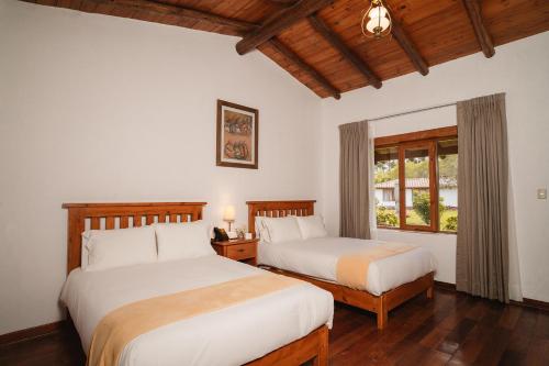 Katil atau katil-katil dalam bilik di Ensenada Hotel y Campo Asociado Casa Andina