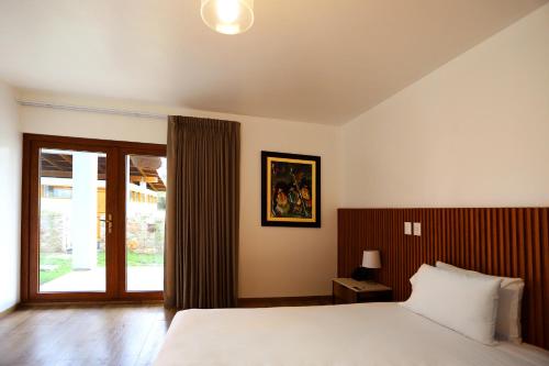 Katil atau katil-katil dalam bilik di Ensenada Hotel y Campo Asociado Casa Andina