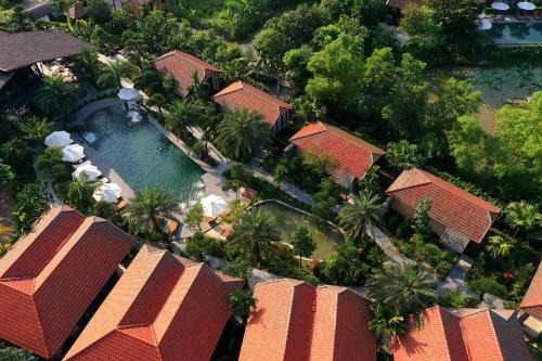 an aerial view of a resort with a pool at Tam Coc Retreat Ninh Binh in Ninh Binh