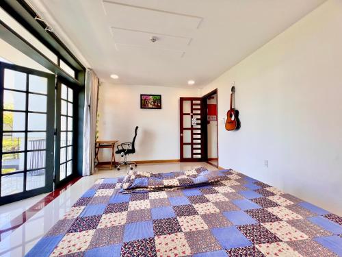 Katil atau katil-katil dalam bilik di KENPI Homestay