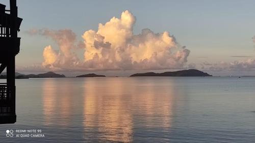 a view of the water with clouds in the sky at Villa Dalam laut 530 in Pantai Cenang