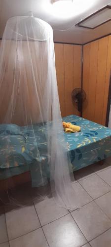 Postel nebo postele na pokoji v ubytování Penu maurua