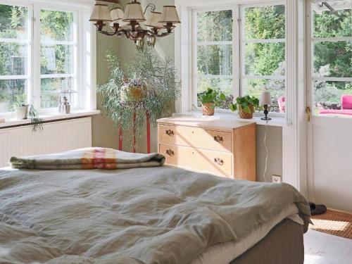 Ένα ή περισσότερα κρεβάτια σε δωμάτιο στο 8 person holiday home in HISHULT-By Traum