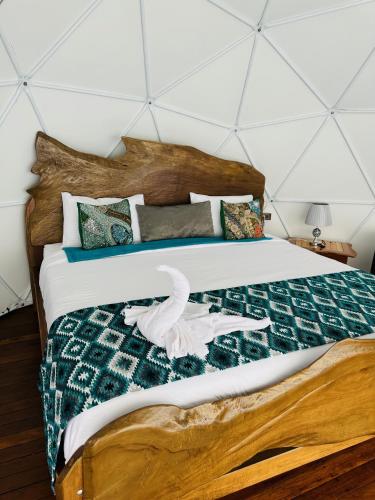 Postel nebo postele na pokoji v ubytování Eco Glamping Cordillera