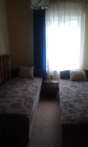 Ένα ή περισσότερα κρεβάτια σε δωμάτιο στο Apartment in Igal - Südtransdanubien 45335