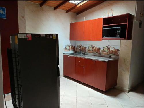 Küche/Küchenzeile in der Unterkunft Acogedora Habitación Sabaneta