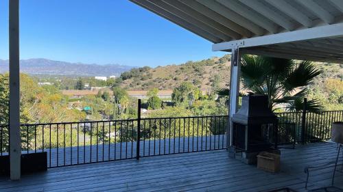 a balcony with a view of a mountain at VIEW PRIVATE FEMALE Short-Long Term Day-Week-Month Un-Furnished Home-House-Estate Bedrooms-Studio-ADU-Guesthouse-Vacation Rental Encino Hills 405-101 xSepulveda in Encino