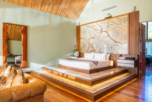 Postel nebo postele na pokoji v ubytování Ida B Domain Resort
