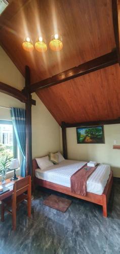 Katil atau katil-katil dalam bilik di Tam's Homestay