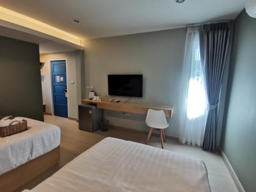 Ένα ή περισσότερα κρεβάτια σε δωμάτιο στο Soi9 poshtel