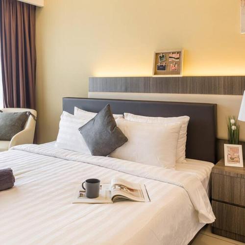 Postel nebo postele na pokoji v ubytování Relax and Chill Studio Genting