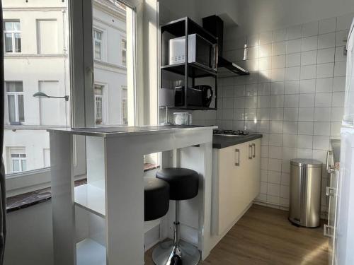 A cozinha ou kitchenette de Studio Ixelles Place Fernand Cocq