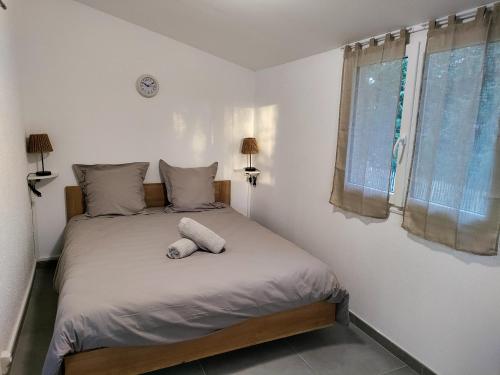 Ένα ή περισσότερα κρεβάτια σε δωμάτιο στο Maison cocooning