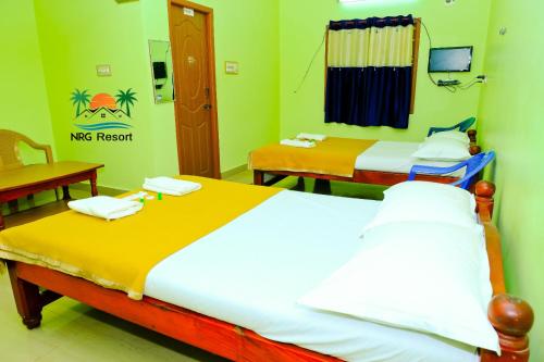 Postel nebo postele na pokoji v ubytování NRG Resort