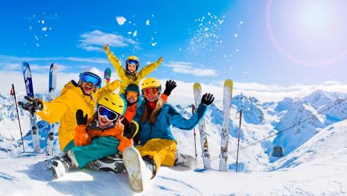 a group of people posing for a picture in the snow at Georgetown Lodge in Georgetown