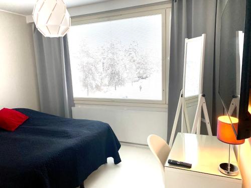 Postel nebo postele na pokoji v ubytování HUTTUNEN 3 - Ihqu kolmio loistavalla sijainnilla!