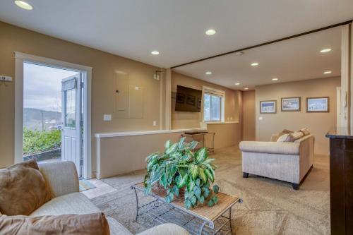 a living room with a couch and a table at Lincoln City Beach House in Lincoln City