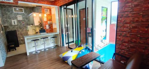 a room with a room with a barber shop at GKH A-2 by Asri Kusuma Villa in Batu