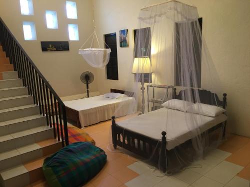 Кровать или кровати в номере Airport Gateway Residence