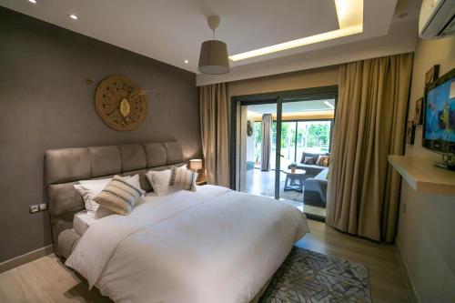 Katil atau katil-katil dalam bilik di Riad Bella Montana