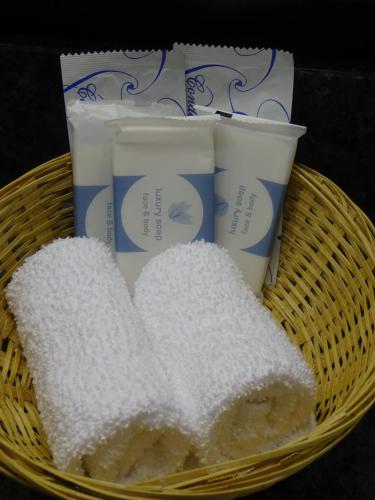 a basket with three slices of bread and someentedented products at Hotel Bliss - Brooklyn in Brooklyn