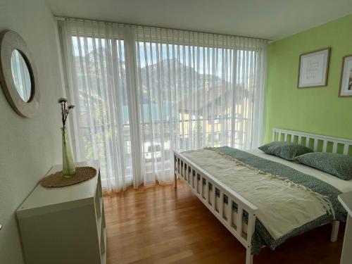 Postel nebo postele na pokoji v ubytování Wohnung „Perla Paradiso“
