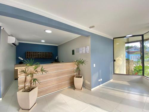 FLAT COM VARANDA E SERVIÇOS NO RIVIERA GREEN – Photos 3