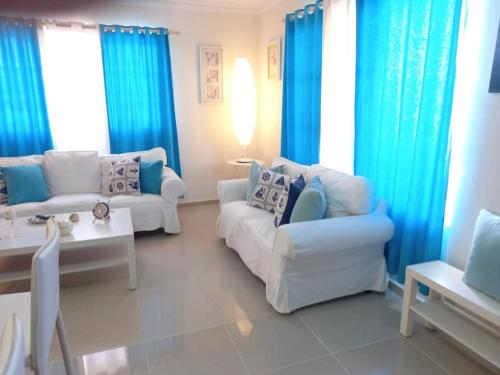 Posezení v ubytování Apartamento Punta Cana playa 2 habitaciones