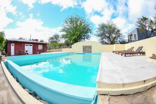 Bazén v ubytování Complejo majua nebo v jeho okolí