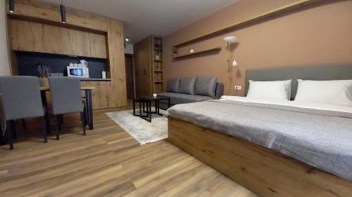 Apartman MK Kopaonikにあるベッド