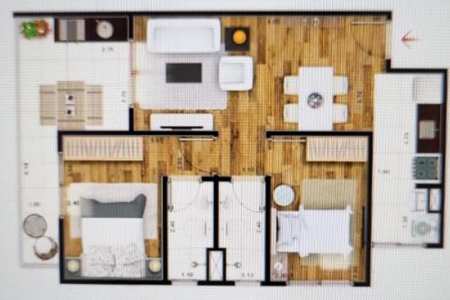 a floor plan of a room with at Apto. a 40m da praia - Itanhaém. in Itanhaém