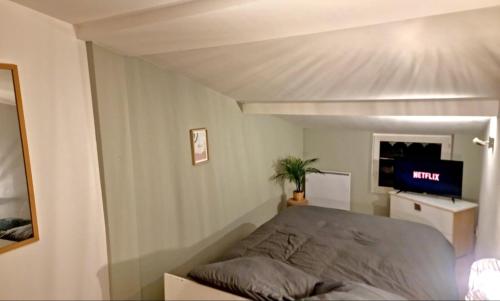 Ein Bett oder Betten in einem Zimmer der Unterkunft st Laurent cocon