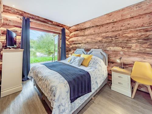 Säng eller sängar i ett rum på Hollacombe Lodge