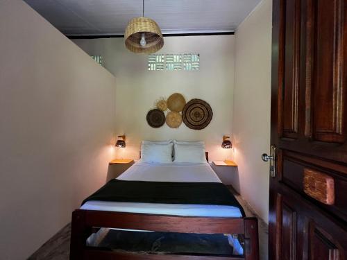Ein Bett oder Betten in einem Zimmer der Unterkunft Pousada Moreré